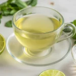 Fresh lemon balm leaves with ingredients for a weight loss recipe.