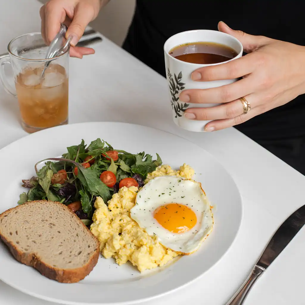 A nutritious breakfast with scrambled eggs and veggies, paired with a zepbound recipe for weight loss.