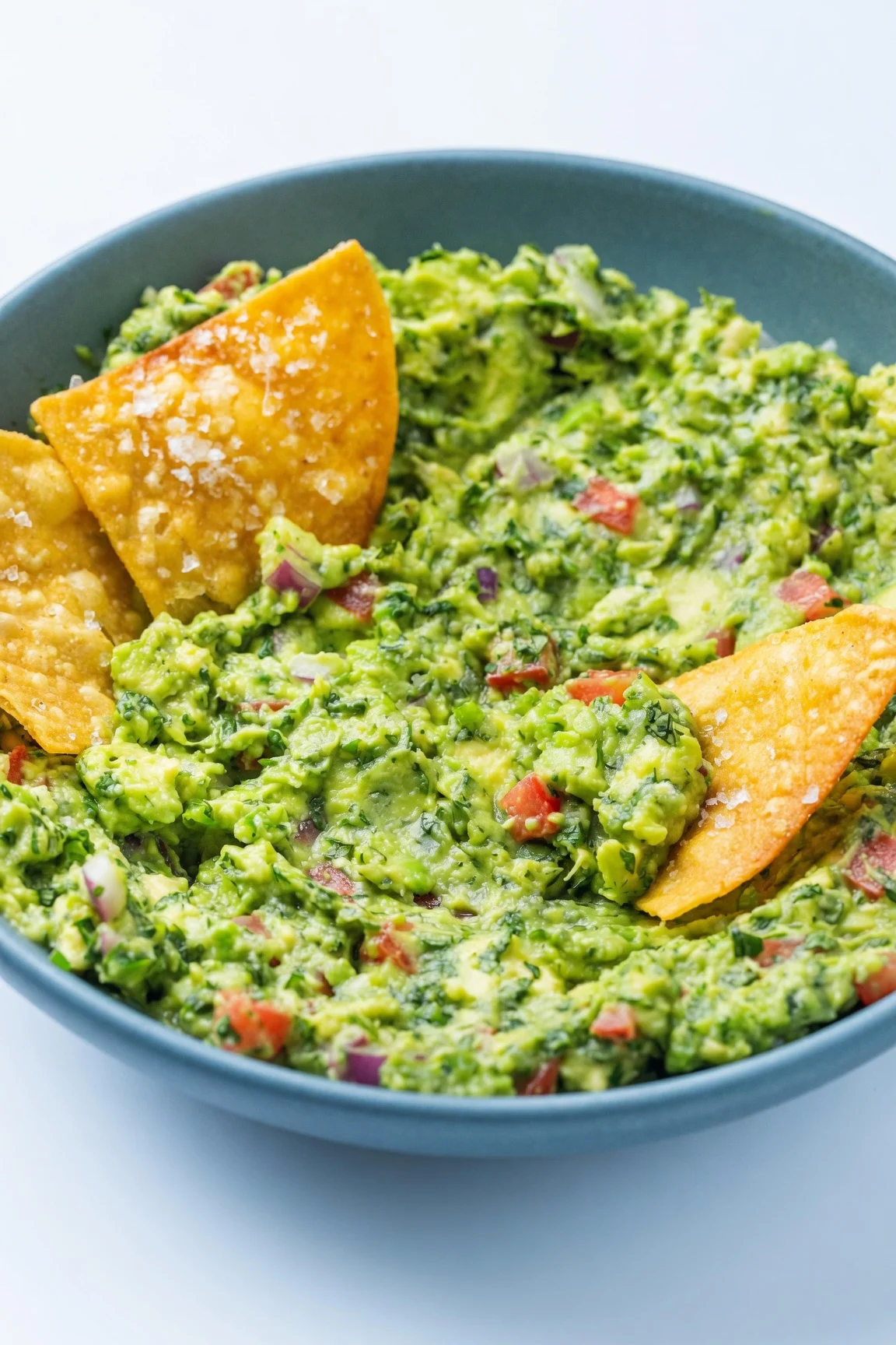 Craving the absolute best Authentic Homemade Guacamole? This simple 10-minute recipe uses fresh lime and cilantro for a perfect, restaurant-quality dip.