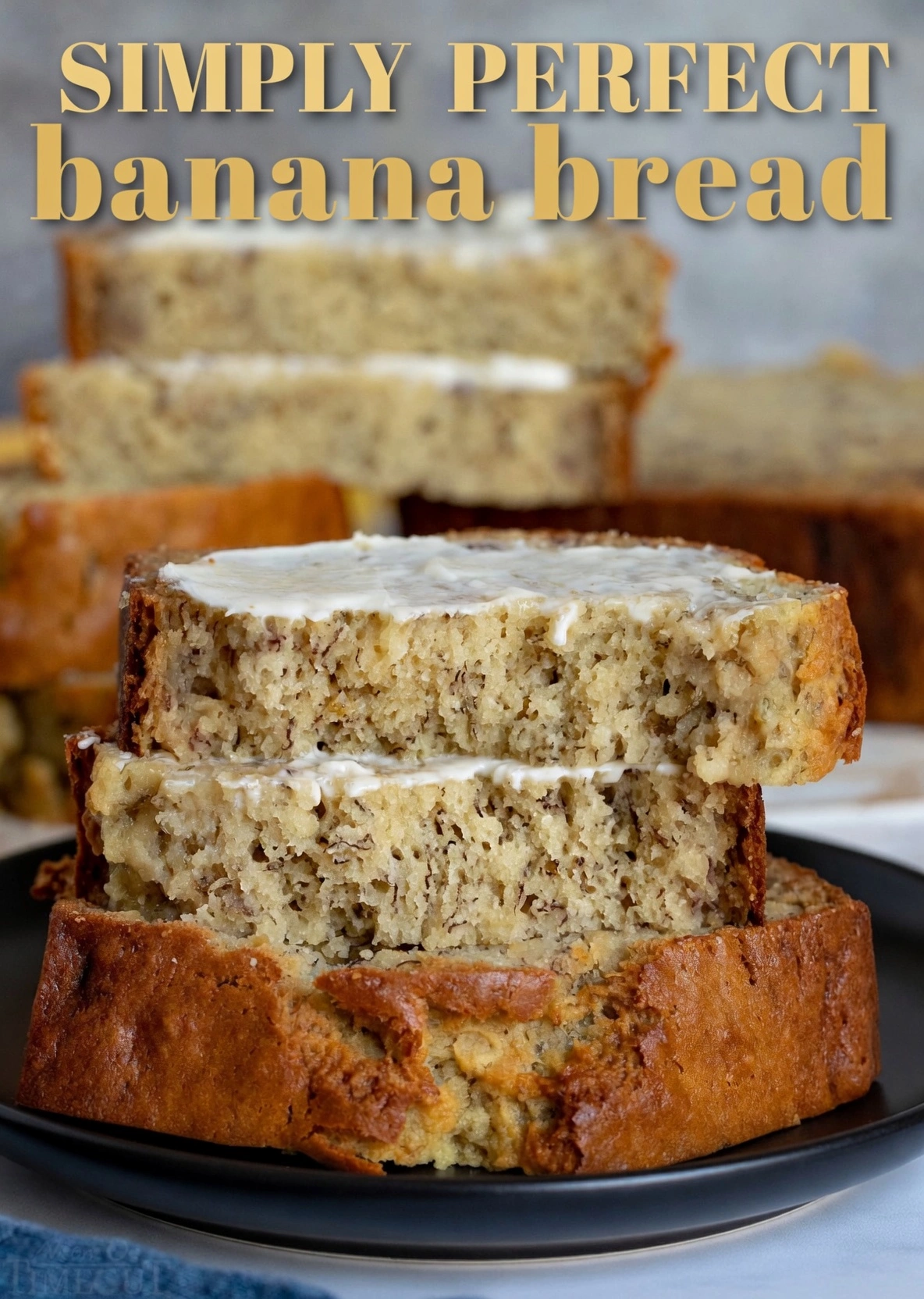 The best banana bread recipe freshly baked and sliced on a rustic wooden cutting board, showing a perfectly moist interior.