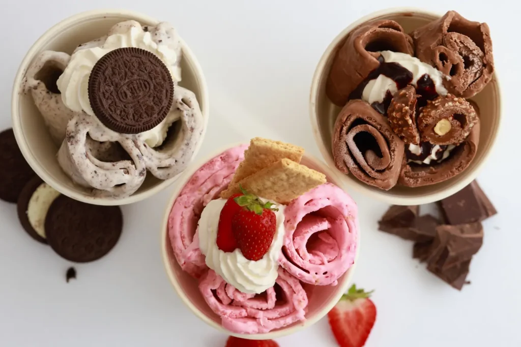 Master fruit ice cream rolls at home with fresh strawberries and pink guava using a stir-fry ice cream pan. Discover professional culinary tips today!
