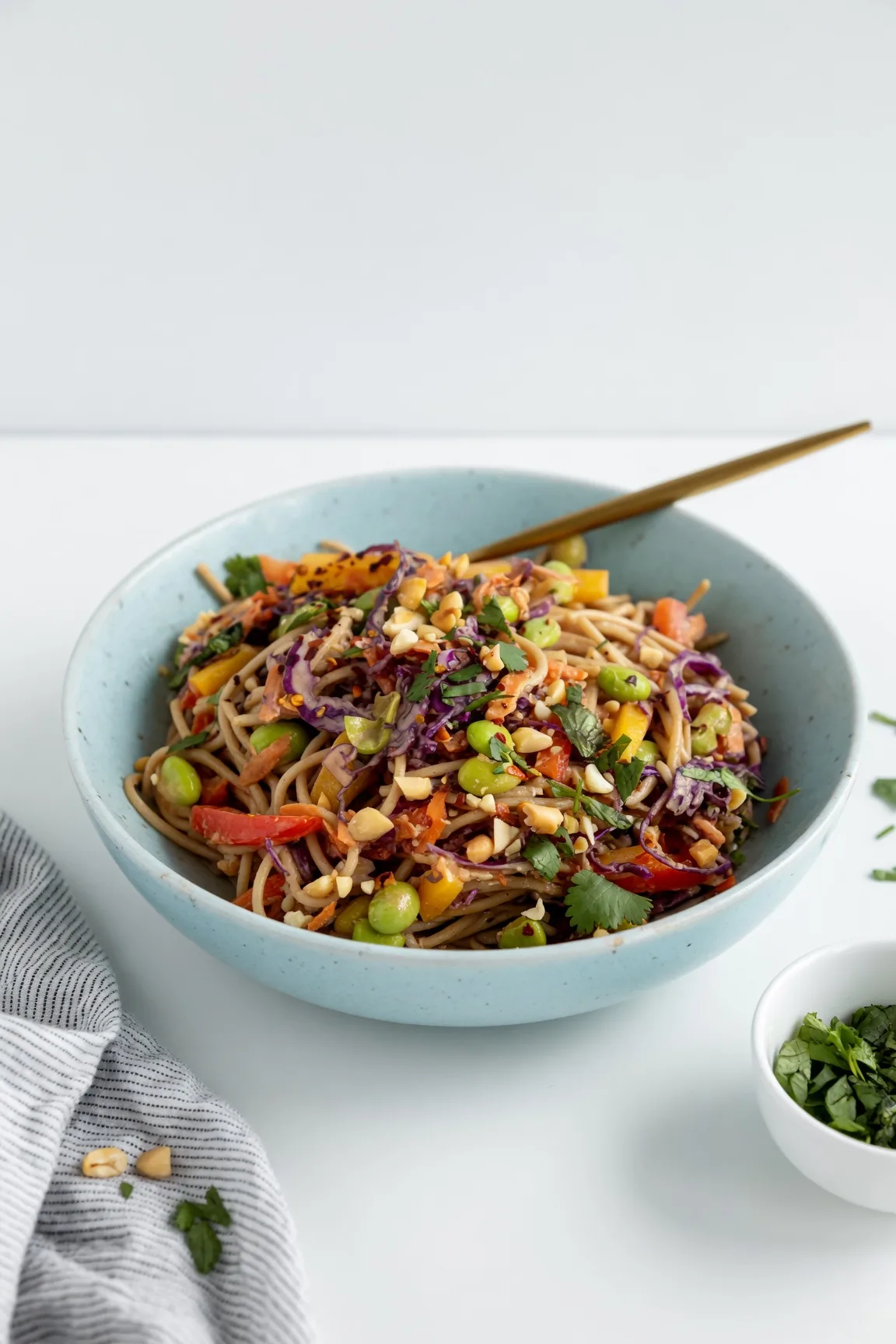 Thai noodle salad made easy! Discover my ultimate recipe featuring a creamy peanut dressing, crunchy veggies, and perfect rice noodles. Ready in 20 minutes!