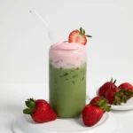 Learn how to make the perfect Strawberry Matcha Latte at home. This refreshing iced drink features a velvety strawberry cold foam and ceremonial grade matcha.