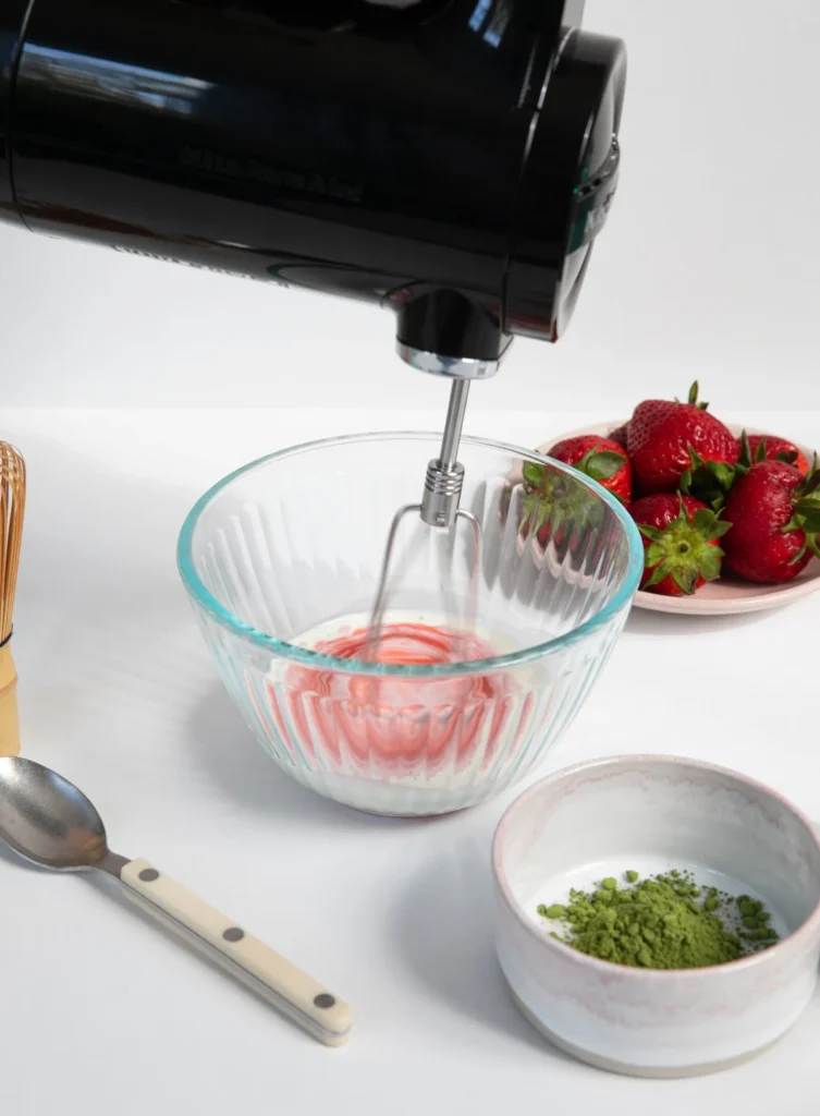 Learn how to make the perfect Strawberry Matcha Latte at home. This refreshing iced drink features a velvety strawberry cold foam and ceremonial grade matcha.