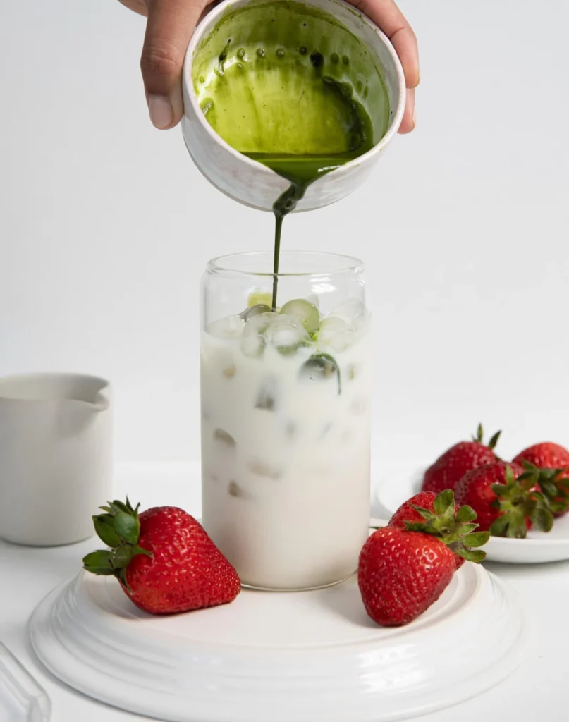 Learn how to make the perfect Strawberry Matcha Latte at home. This refreshing iced drink features a velvety strawberry cold foam and ceremonial grade matcha.