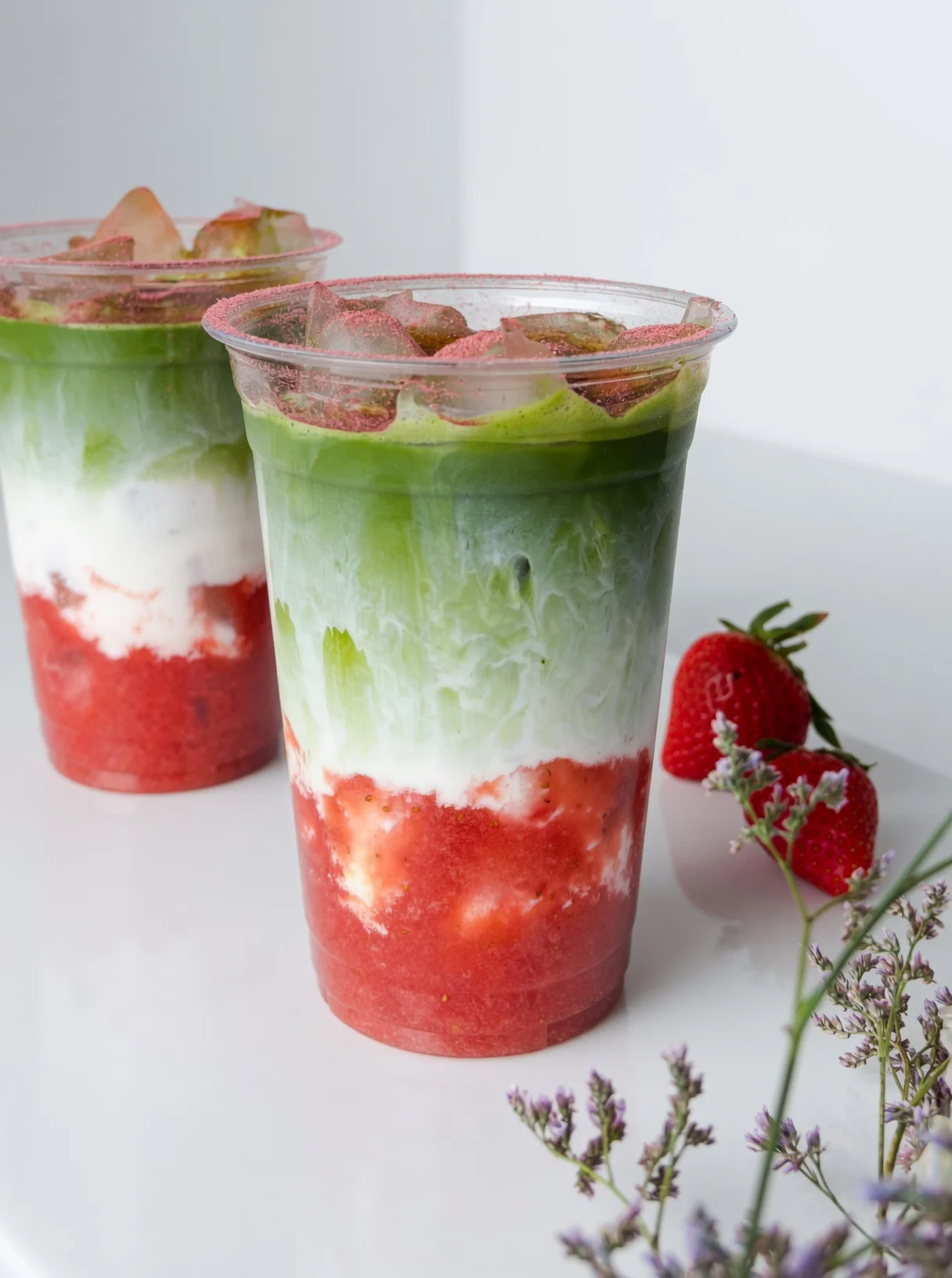 Master this strawberry matcha recipe at home. Discover the barista secrets to perfectly layered iced matcha with fresh, sweet strawberry puree.