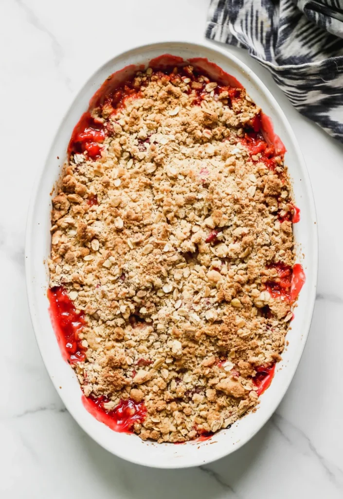 Master the perfect Strawberry Rhubarb Crisp with a flawless sweet-tart filling and golden oat crumble. A fail-proof recipe for home bakers!